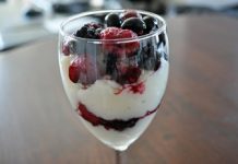 Low fat yogurt mixed with berries, cottage cheese